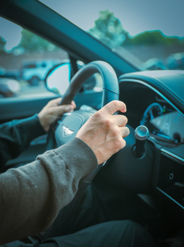 car hand wheel, symbolizing control, navigation, and the driver'